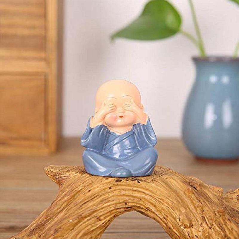 Multicolor Polyresin cute monks sitting on a Trunk - Green Ninja